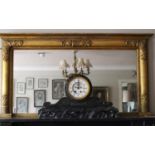 A 19th Century Plaster Gilt Overmantel Mirror, the rectangular plate within cushion surround applied