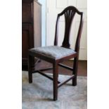 An Early 19th Century Mahogany Chair with shaped and pierced waisted splat, the top rail carved with