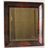 A Victorian Wall Mirror in mahogany flame veneer wedge frame with bevelled glass. 19in x 17in.