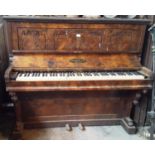 A Walnut Upright Grand Piano by Chappell & Co. London.