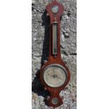 A 19th Century Rosewood Cased Wheel Barometer with onion terminals, having hygrometer, thermometer