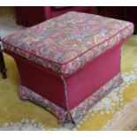 An Upholstered Stool, the lift-up hinged top revealing storage space. 21in x 25in x 18in high.