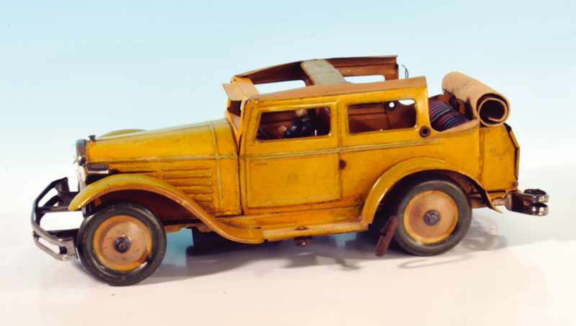 GÜNTHERMANN Auto mit Rollverdeck 38 cm, gelb lithogr., Rollverdeck nicht vollständig,