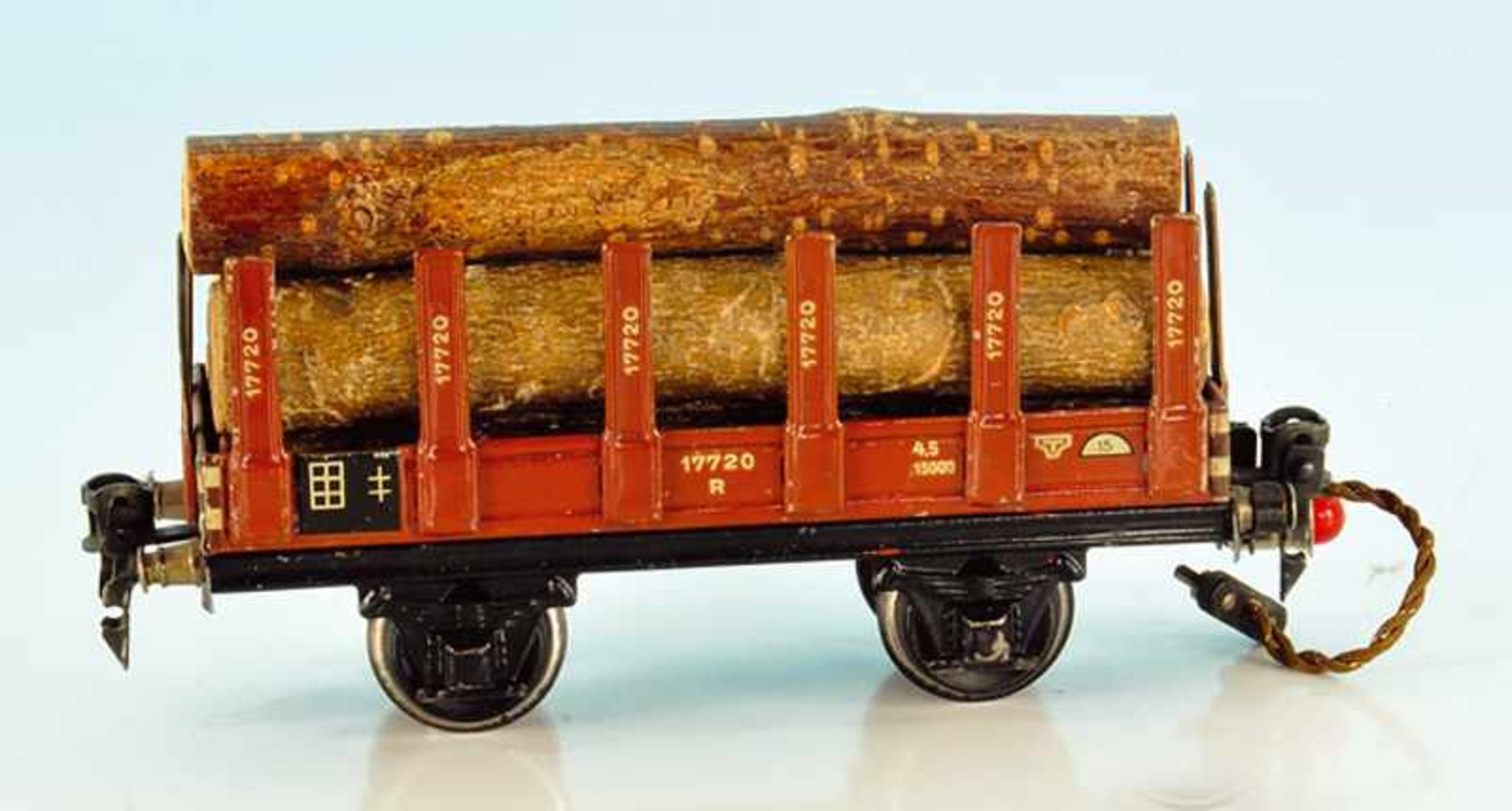 MÄRKLIN Rungenwagen 1742/0 24 cm, mit orig. Holzladung, leichte Alterungs- und Gebrauchsspuren.