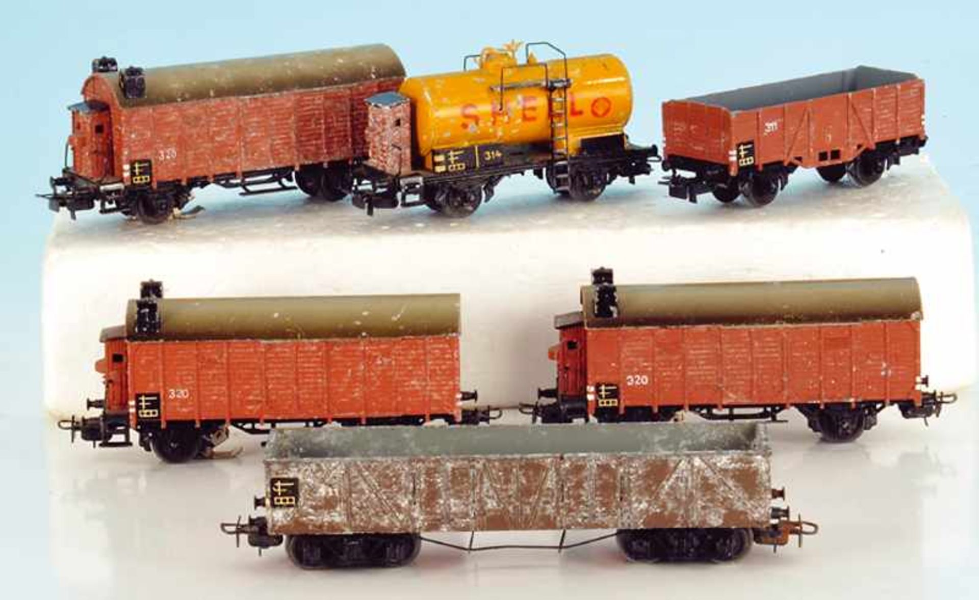 6 MÄRKLIN Guss-Güterwagen mit starken Ausblühungen, 3 x 320 S, 1 x 314 "SHELL", 1 x 331, 1 x 311,