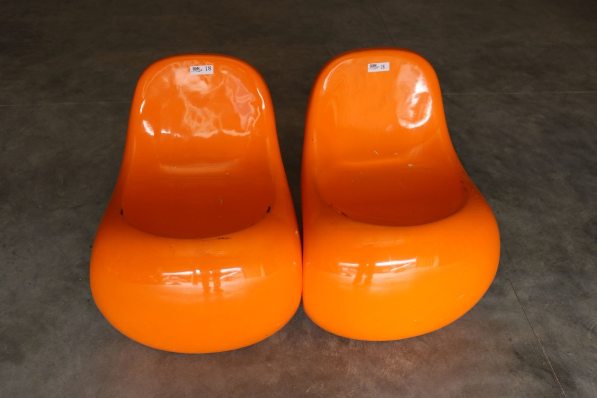 Two Small Hard Plastic Chairs