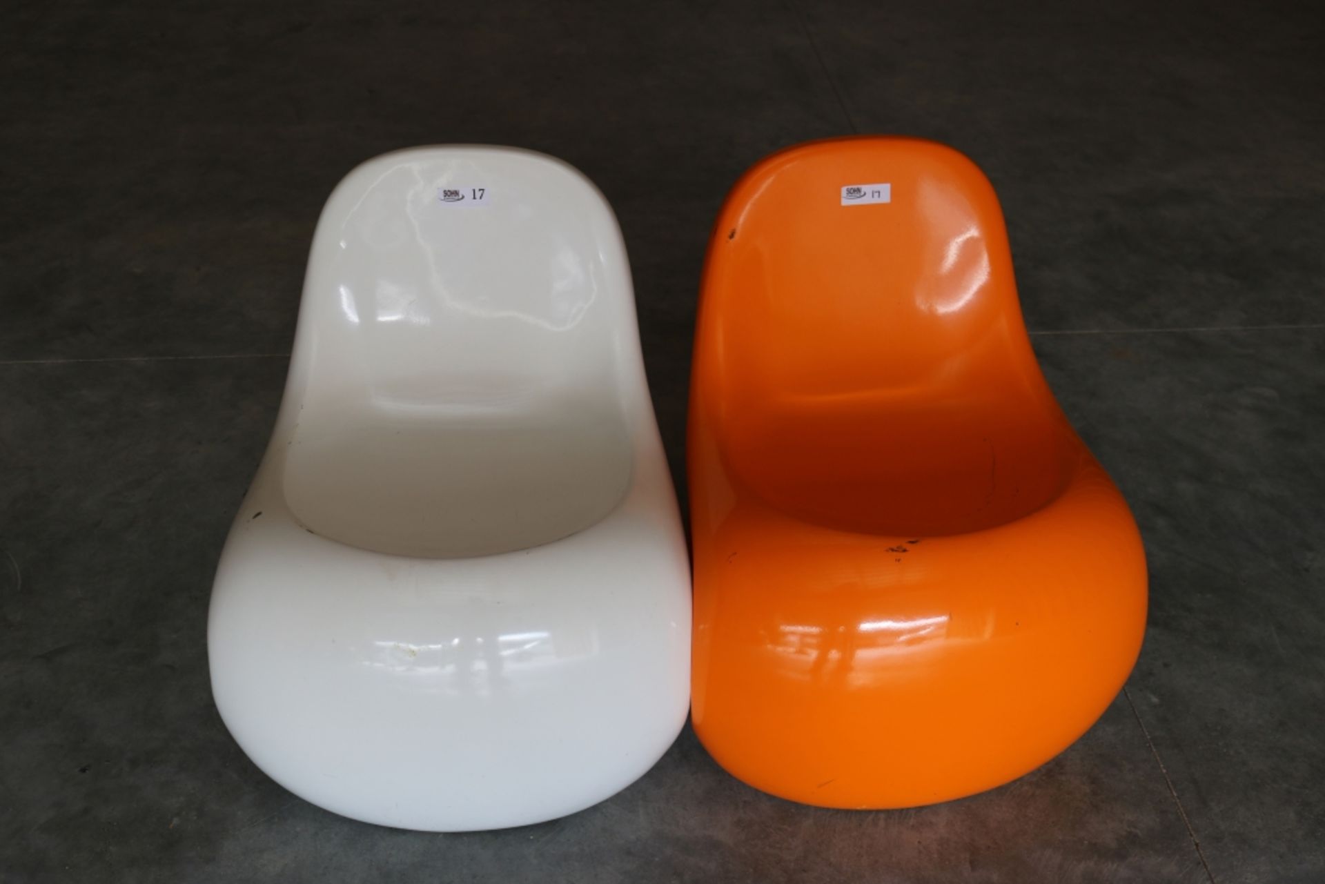 Two Small Hard Plastic Chairs