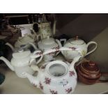 A collection of vintage tea pots