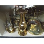 A selection of brassware including oil lamp, candlestick's, horse brasses etc