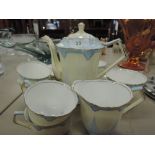 An Aynsley blue and cream deco style coffee service (coffee pot A/F)