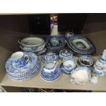 A shelf of blue and white including Copeland Spode's Italians