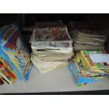 A shelf of late 20th century Dandy, Beano and similar comics and annuals including Dandy Cartoon