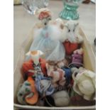 A box of felt mice in various costume