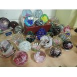 A selection of thirty glass paperweights including Caithness (boxed), Mdina, Alum Bay (Isle of