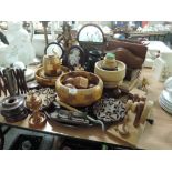 A large selection of treen including turned pieces, vintage wool winder, picture frames, carvings