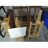 Four small artists easels and a artists box