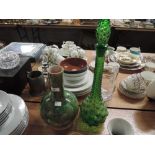 A gourd shaped studio pottery vase and a green glass bottle