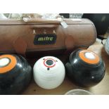 A set of Mitre green bowls with jack in leather carry bag