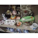 A shelf of ceramics including Beswick, Masons, Royal Doulton, Royal Crown Derby and Poole etc