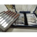 Two boxes of flatware including butter knifes etc