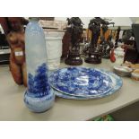 A late 19th century gourd shaped Doulton Burslam vase A/F and two blue and white meat platters