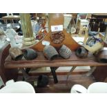 A treen pipe rack and selection of smokers pipes