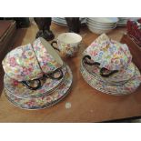 A Burlington ware chintz floral part tea service, five plates, six saucers and five cups (one