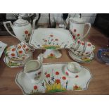 A Crown Ducal Poppies coffee service with sandwich plate, cake stand etc
