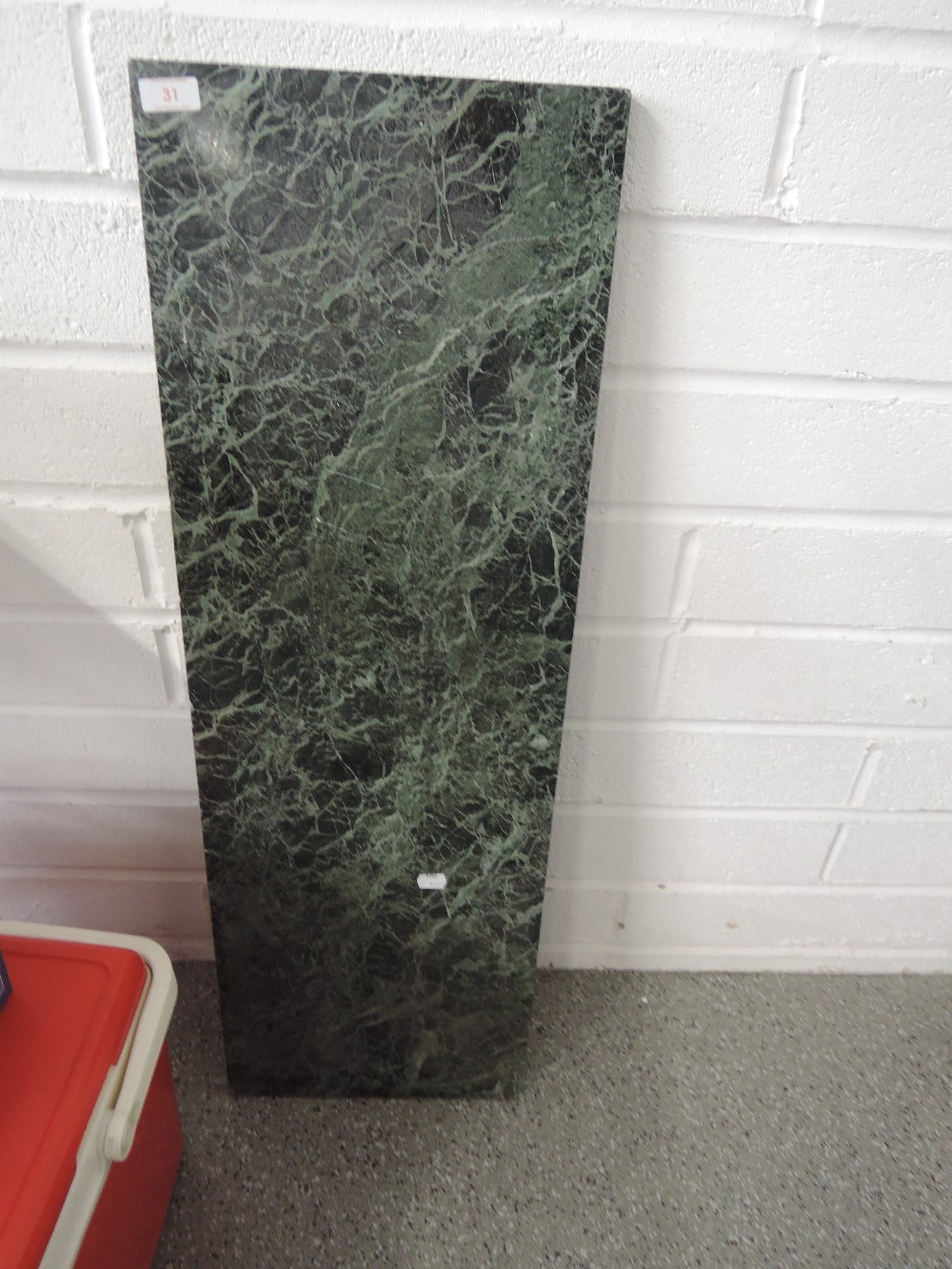 A piece of green marble 36'x12'