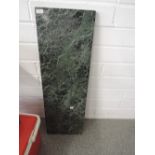 A piece of green marble 36'x12'