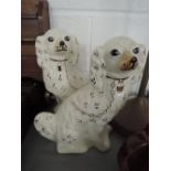 A pair of Staffordshire style dogs