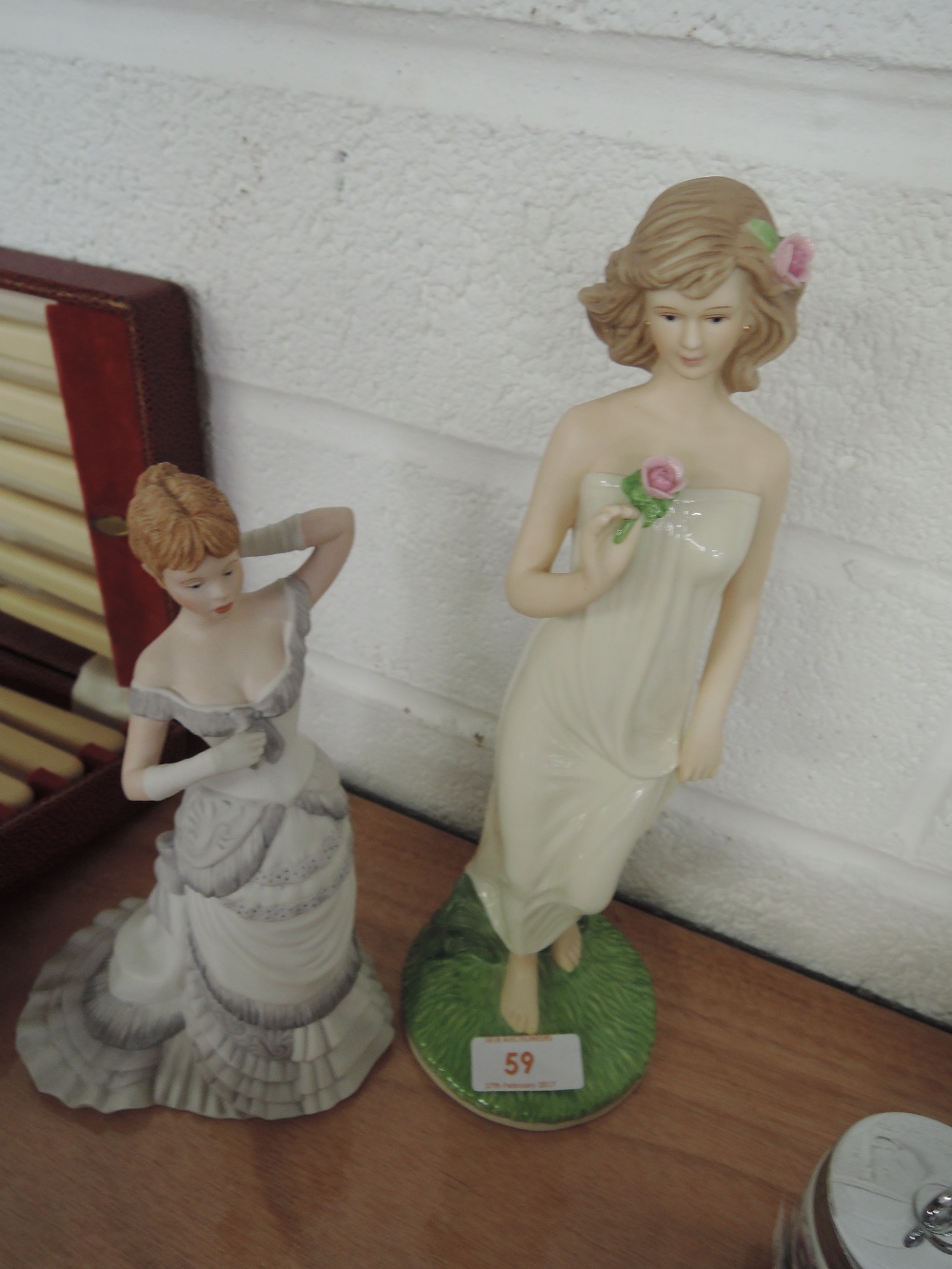 A Coalport figurine 'The Age of Elegance, Grand Parade' and The regal Collection 'Lisa'