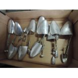 A collection of metal shoe shapers including Vic Tree Deluxe and W Barratt & Co Ltd, Northampton