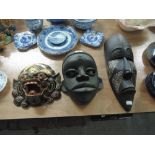 Three tribal art masks