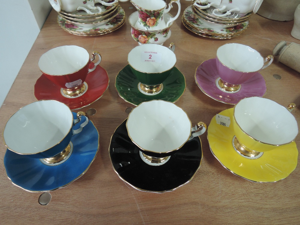 An Adderley harlequin set of six cups and saucers