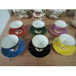 An Adderley harlequin set of six cups and saucers