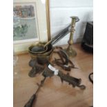 A selection of brass and metal ware including pans, candlestick, man in the moon, Sphinx and