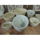 Six ceramic jelly moulds