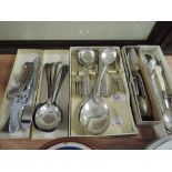 A selection of boxed vintage flatware