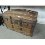 A large vintage wooden bound travel chest