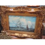 A gilt framed print after E W Cooke sailing ships