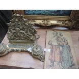 A brass desk stand letter rack with inkwell inserts and a Sarsaparilla advert on board