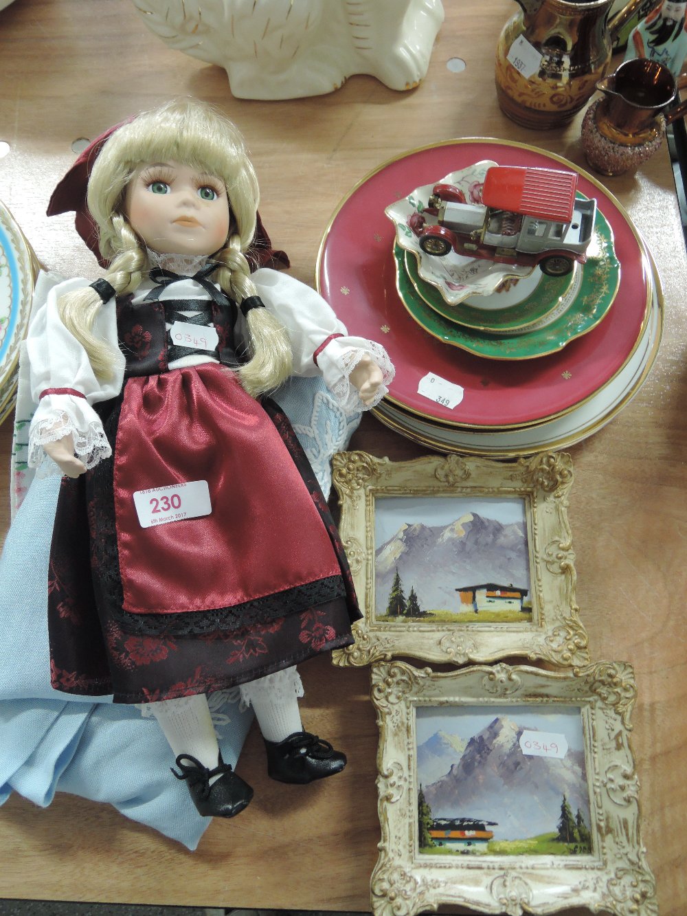 A selection of miscellanpous including doll, table linen, miniature pictures etc
