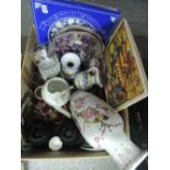 A box of decorative ceramics etc