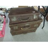 Three vintage suitcases