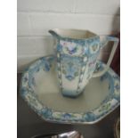 A wash bowl and jug stamped Tyne