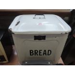 An vintage enamel bread bin