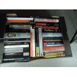 A box of books, mainly military reference including Hitler and Karl Marx