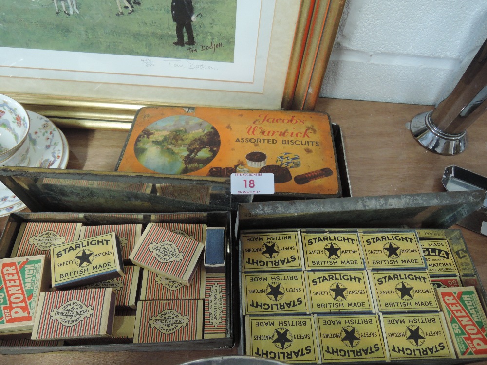 Three vintage tins containing a collection of match boxes