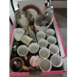 A box containing a selection of ceramics and glass ware